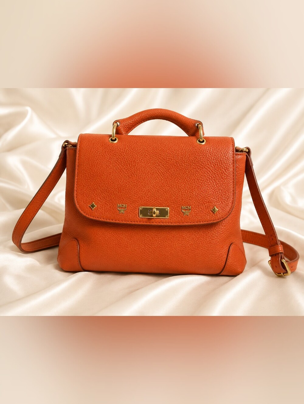 MCM Orange Pebbled Leather Satchel with Gold Hardware